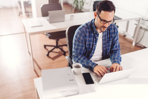 istock Businessman working in the office 1256196841