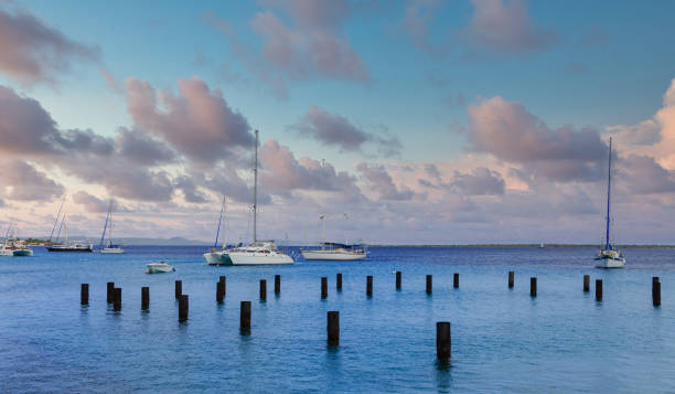 istock Sailboats Past Pilings in Bonaire 1256200107