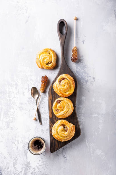 istock Sweet swirl buns with raisins for breakfast 1256201992