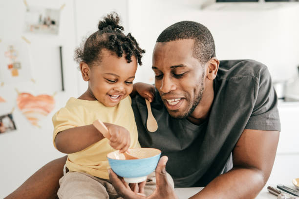 istock Dad taking care of his baby during lockdown 1256202474
