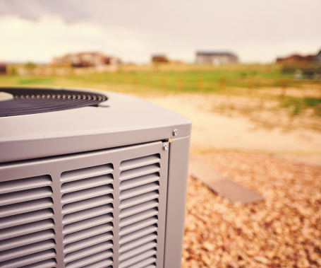 Air conditioner unit in residential yard