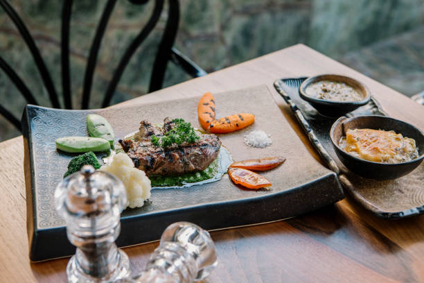 istock Grilled meat with sauce 1256204480
