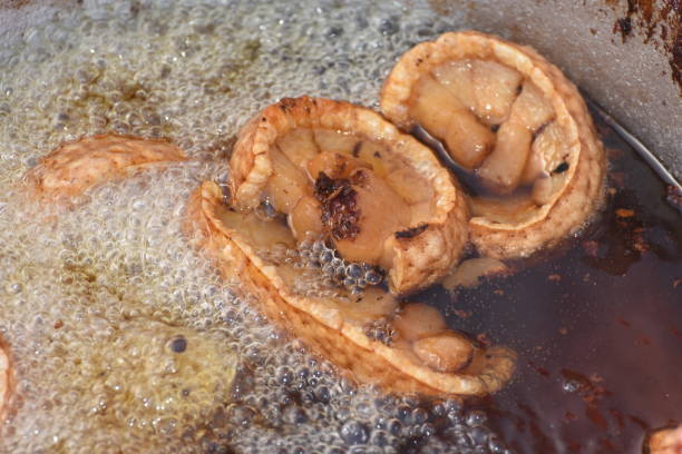 istock Romanian culinary specialty - grilled fat bacon fried in oi 1256206839