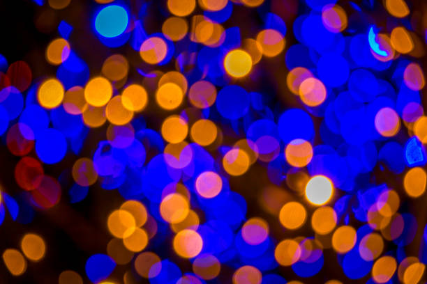istock Orange and Blue Bokeh Christmas Lights 1256218956