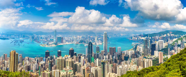 panoramablick auf hongkong - hong kong cityscape flowing water built structure stock-fotos und bilder