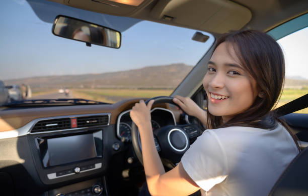 istock Happy young couple enjoying in drive 1256228828
