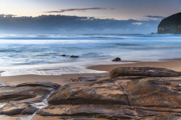 istock Sunrise seascape and low cloud bank 1256237203