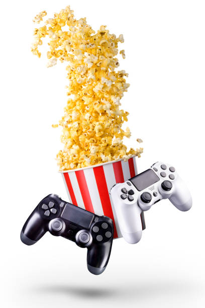 istock Flying popcorn and video game joystick gamepad isolated on a white background 1256237663