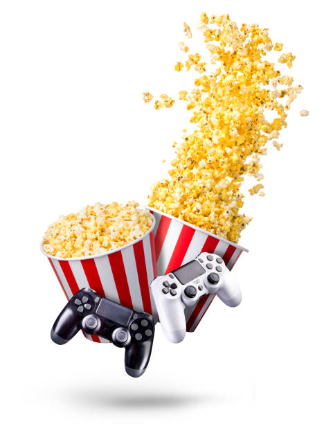 istock Flying popcorn and video game joystick gamepad isolated on a white background 1256238631