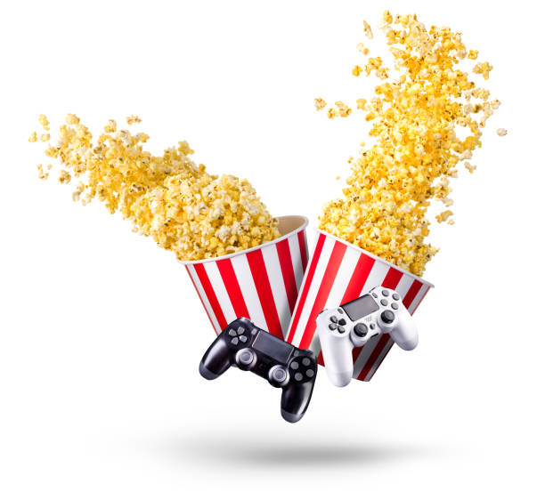 istock Flying popcorn and video game joystick gamepad isolated on a white background 1256238683