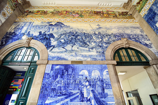 Blue azuelo tile mural of the São Bento Railway Station in Porto, Portugal