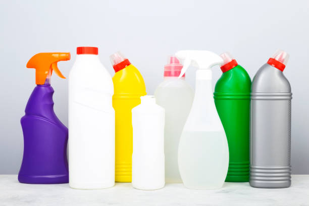 istock Various detergents and cleaning products agent, gray background 1256246803