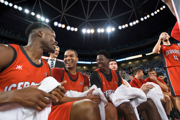 istock Basketball players smiling during break 1256246928