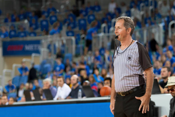 istock Referee whistling in court 1256247779