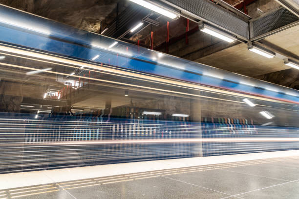 istock Train fast moving at subway station 1256247833