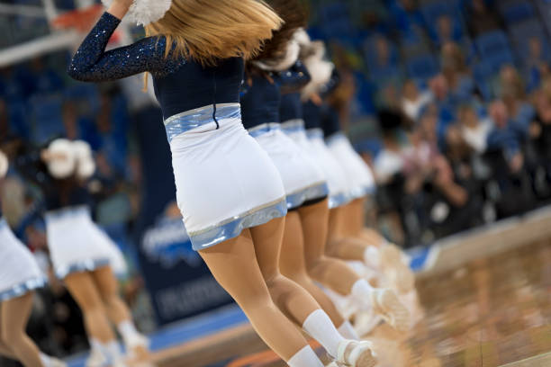 istock Cheerleaders performing in court 1256248306