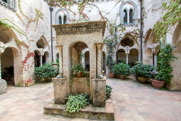 Ancient Well in Courtyard of VIlla Cimbrone, Italy Ancient stone Well in Courtyard of VIlla Cimbrone, Amalfi coast, Italy ravello stock pictures, royalty-free photos & images