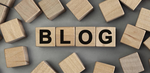 istock Word BLOG made with wood building blocks. Top view 1256257372