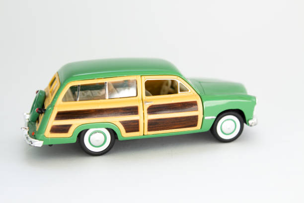 istock classic toy car on a white background 1256258431
