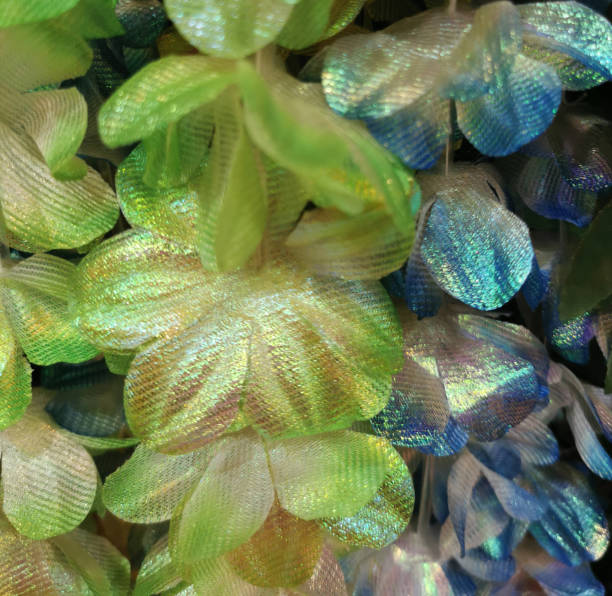 istock artificial flowers made of background loseup, selective focus, noisy filter, blurred background 1256261253