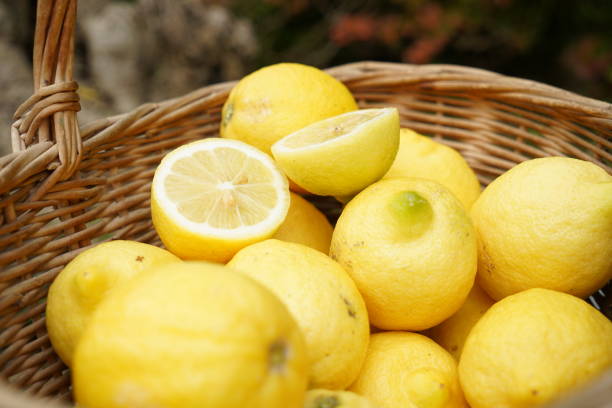 istock fresh lemons collected in a wooden basket 1256262584