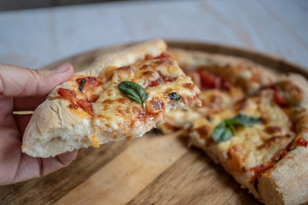 istock classic pizza margherita with mozzarella and basil, make pizza at hom 1256263230