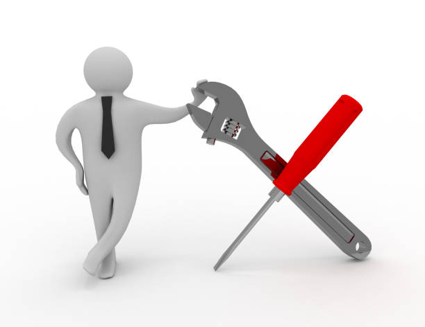 istock person with a screwdriver and a wrench 1256265112