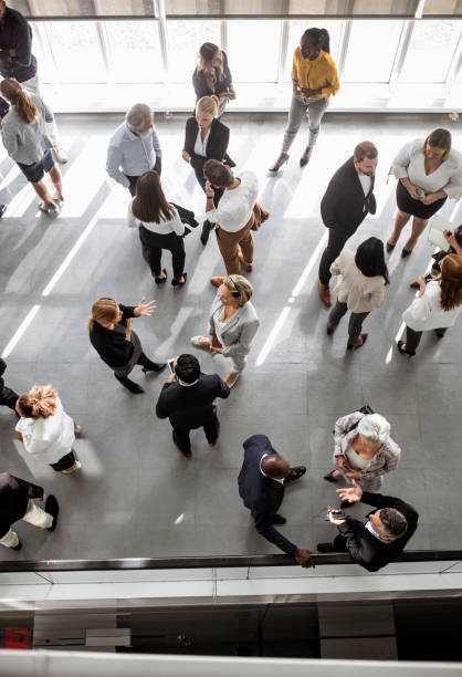 istock Business people discussing in the hallway 1256265224