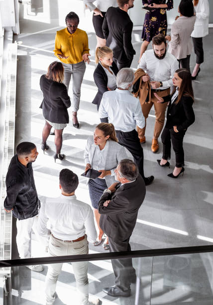 istock Business people discussing in the hallway 1256265261