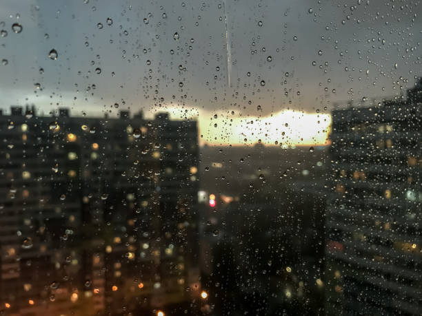 istock Background drops of water. Raindrop on window panes 1256265464