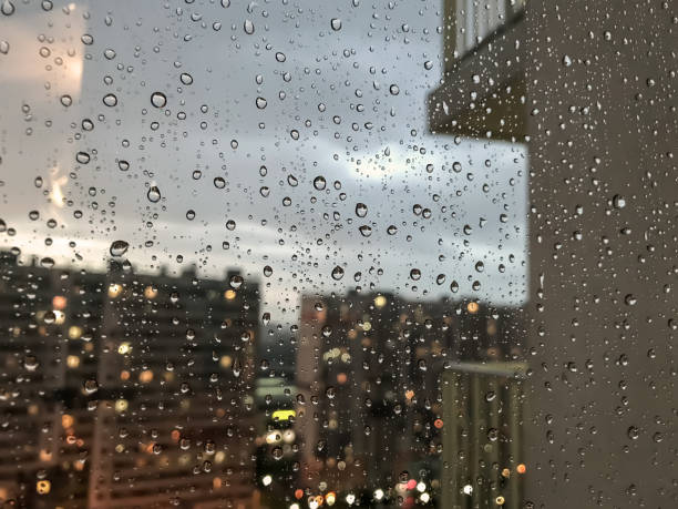 istock Background drops of water. Raindrop on window panes 1256265485