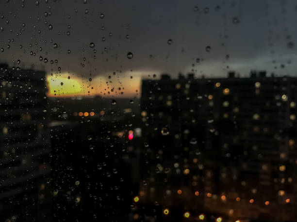 istock Background drops of water. Raindrop on window panes 1256265499