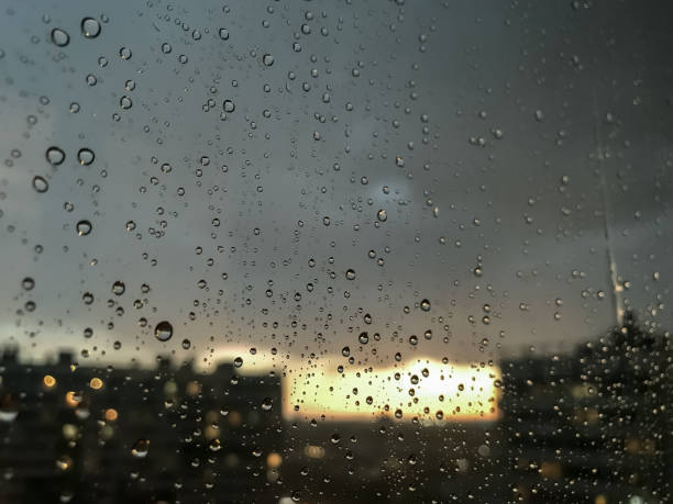istock Background drops of water. Raindrop on window panes 1256265529