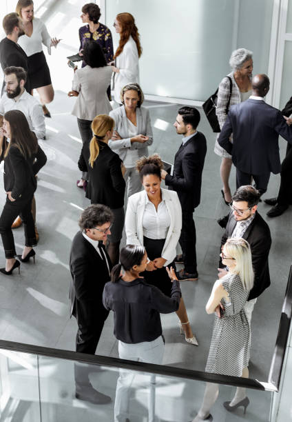 istock Business people discussing in the hallway 1256265562