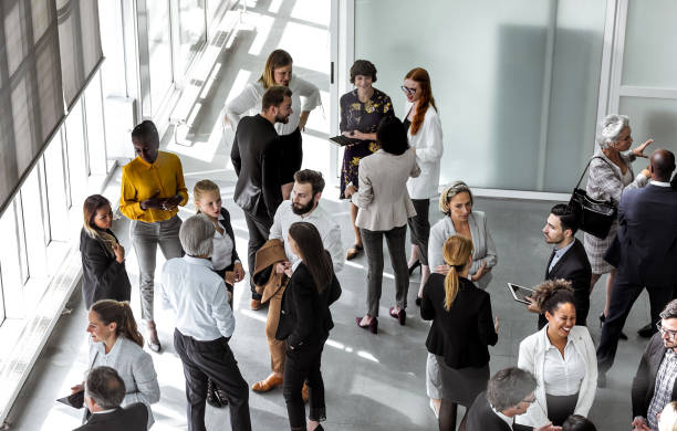 istock Business people discussing in the hallway 1256265598