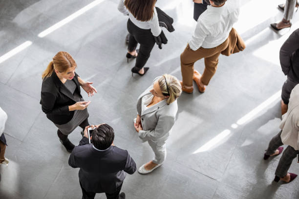 istock Business people discussing in the hallway 1256265991