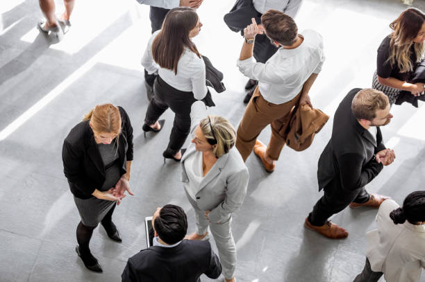 istock Business people discussing in the hallway 1256266007