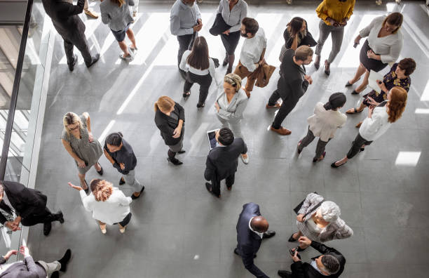 istock Business people discussing in the hallway 1256267218