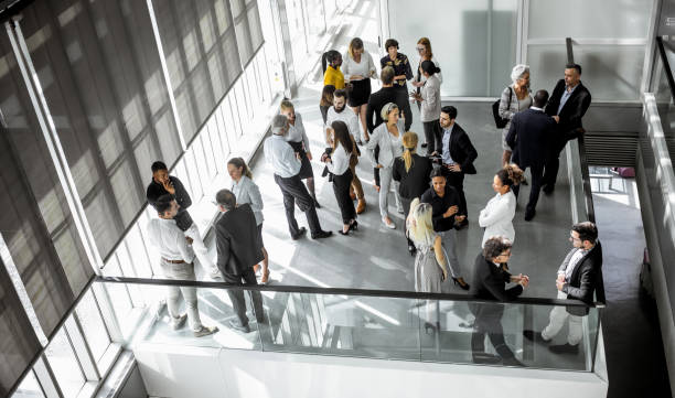 istock Business people discussing in the hallway 1256267224