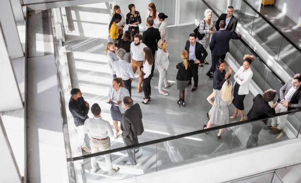 istock Business people discussing in the hallway 1256267286