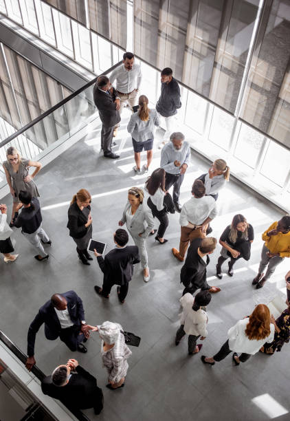 istock Business people discussing in the hallway 1256267341