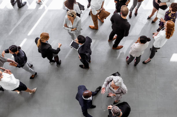 istock Business people discussing in the hallway 1256268064
