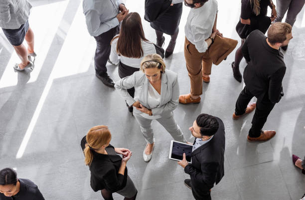 istock Business people discussing in the hallway 1256268157