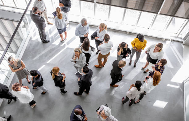 istock Business people discussing in the hallway 1256268324