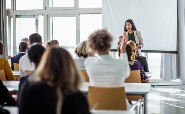 istock Business people at a conference 1256268332
