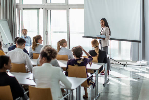istock Business people at a conference 1256268649