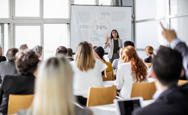 istock Business people at a conference 1256268967