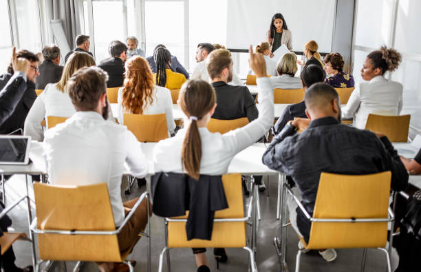 istock Business people at a conference 1256268970