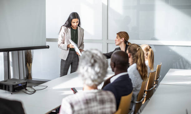 istock Business people at a conference 1256269133