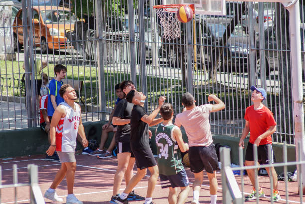 basket ball on the floor half part hit by shadow